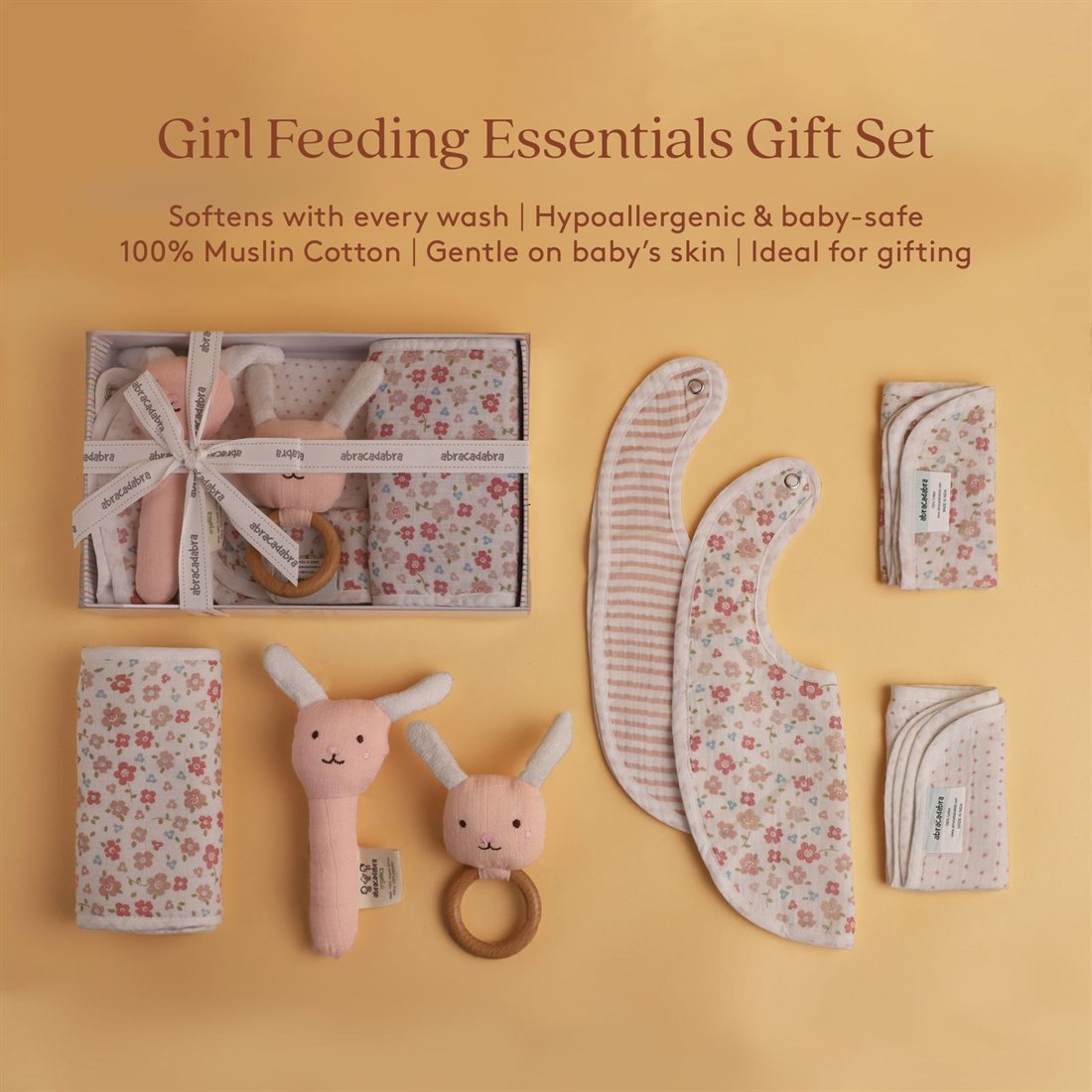 Girl feeding essentials gift set with bunny rattle, floral bibs, teether, burp cloth and muslin wipes