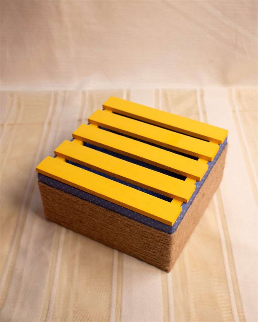 Yellow slatted-lid crate basket