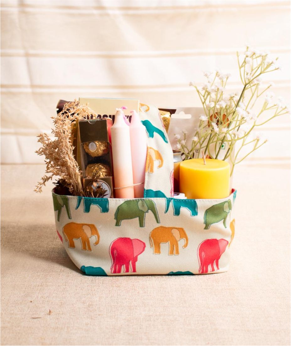Gift hamper with candles and treats